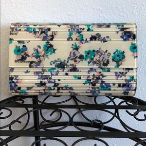 BCBGeneration acrylic floral clutch
